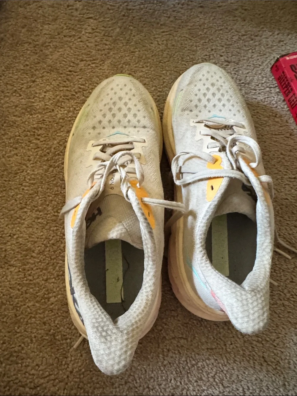 Hoka one women’s  White Running Shoes with Yellow Accents Clifton 9